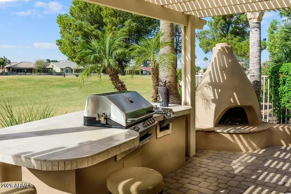 a view of a swimming pool with a patio