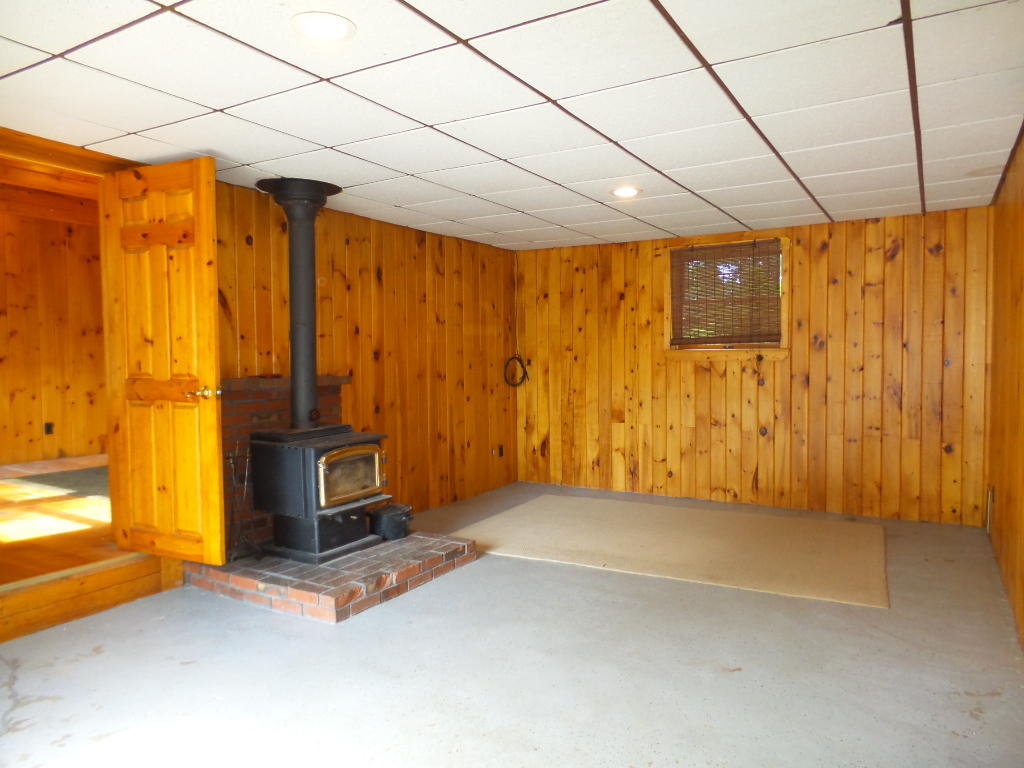 132 Hanscom Road Benton, ME 04901 - Photo 25 of 43 Bonus Room with Stove