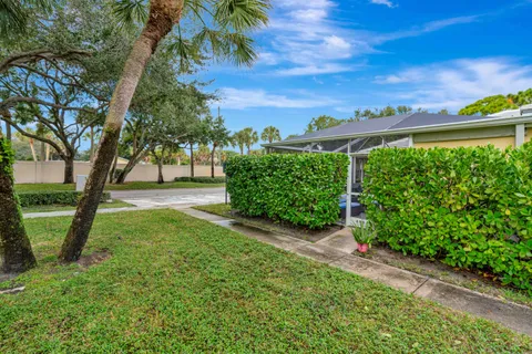 a view of backyard with green space