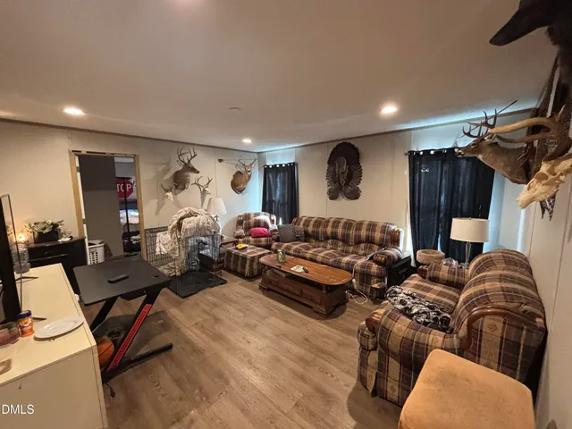 a kitchen with sink stove and cabinets
