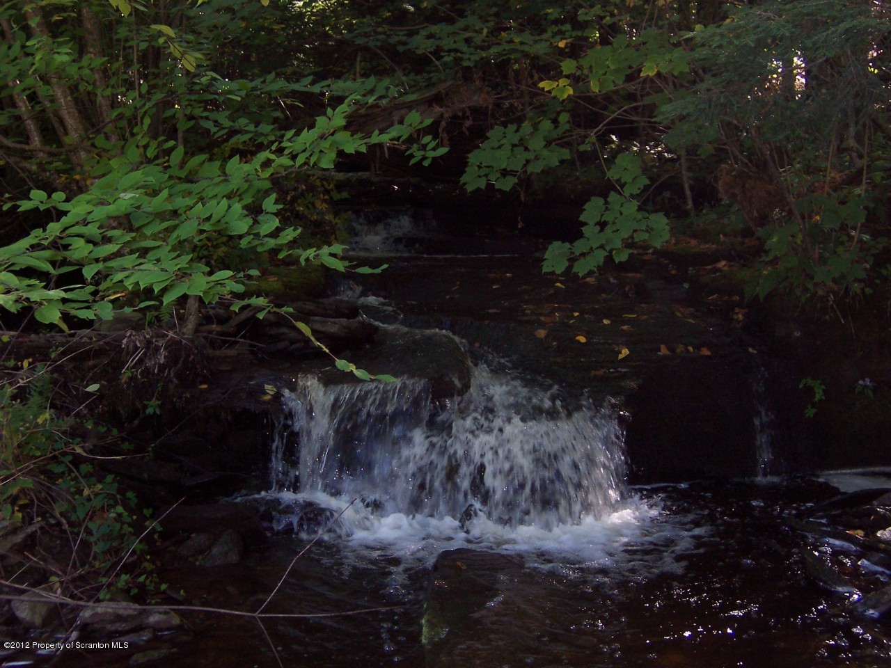 655 Thorn Hill Road Thompson, PA 18465 - Photo 4 of 9 Waterfall near drive entry