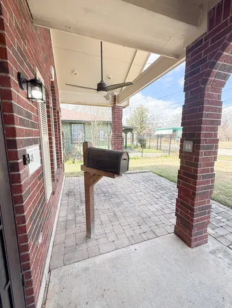 a view of a porch with a patio