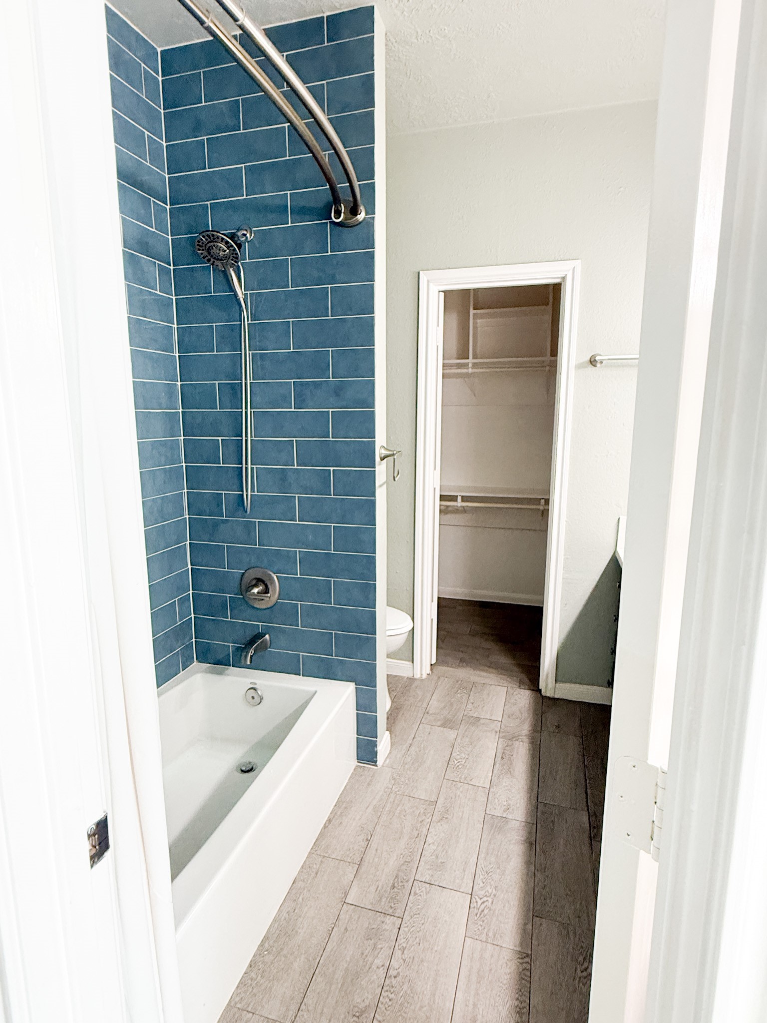 3348 Reeves Street Houston, TX 77004 - Photo 4 of 14 a bathroom with a bathtub and a shower