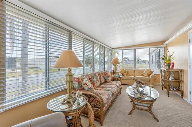 a kitchen with a refrigerator and a stove