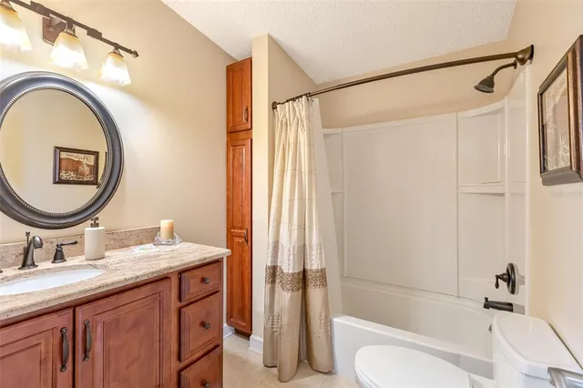 an aerial view of a house with a garden