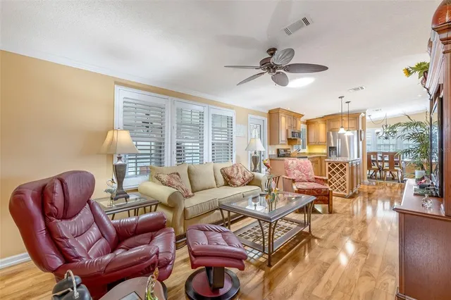 a kitchen with stainless steel appliances granite countertop a stove microwave and refrigerator