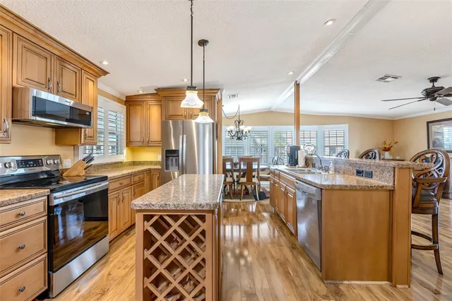a living room with lots of furniture and a view of living room