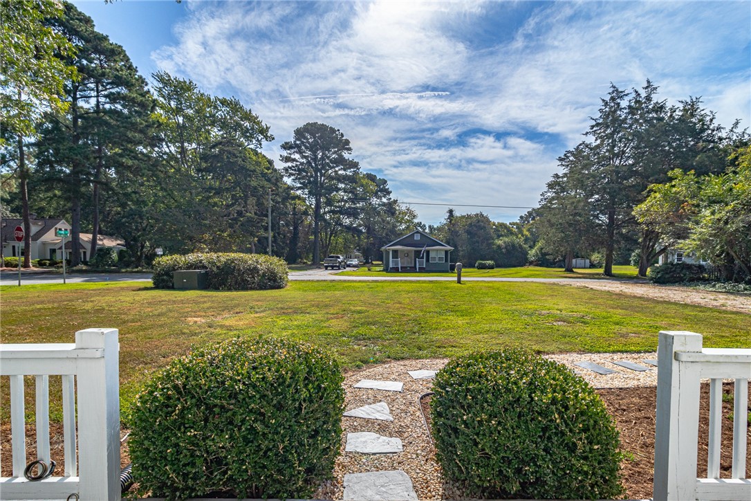97 Virginia Road Irvington, VA 22480 - Photo 5 of 39 View of green lawn