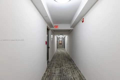 a view of hallway with stairs