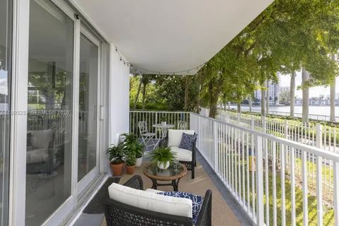 a view of balcony with furniture