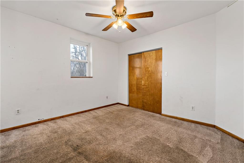 545 Stokes Avenue Braddock, PA 15104 - Photo 15 of 34 an empty room with windows and fan