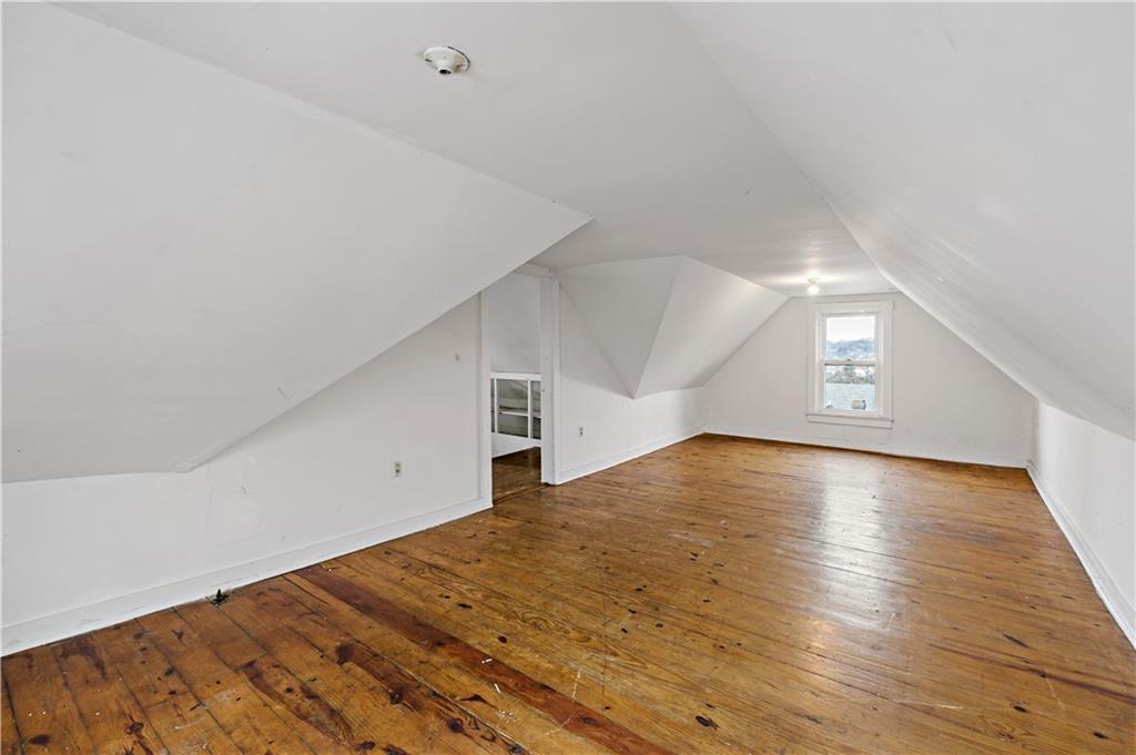 545 Stokes Avenue Braddock, PA 15104 - Photo 24 of 34 a view of empty room with wooden floor