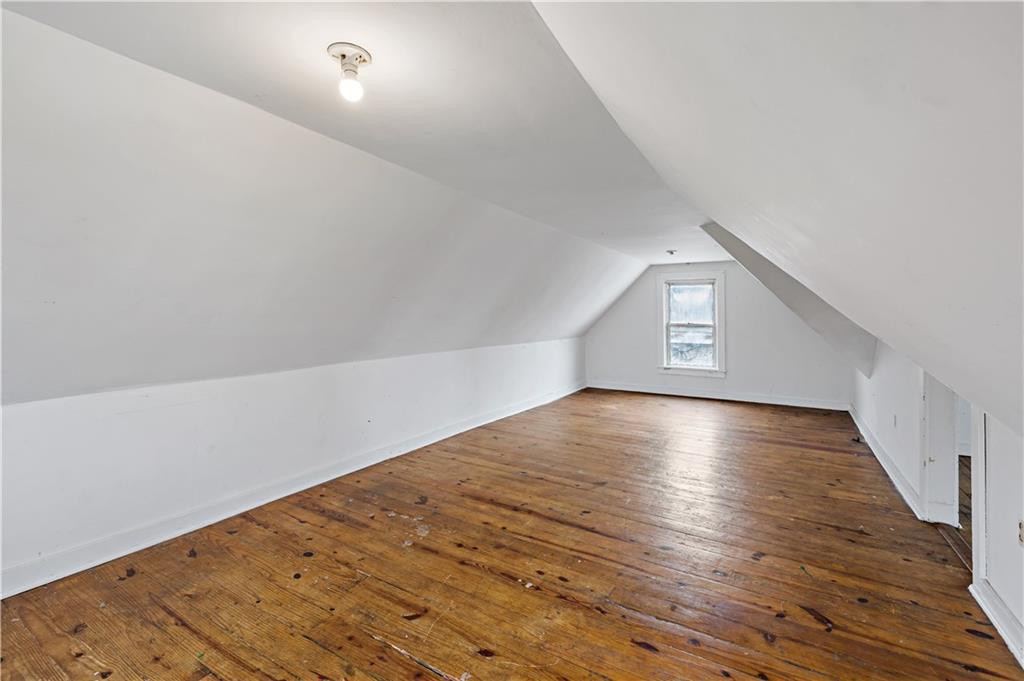 545 Stokes Avenue Braddock, PA 15104 - Photo 25 of 34 a view of a room with wooden floor and window