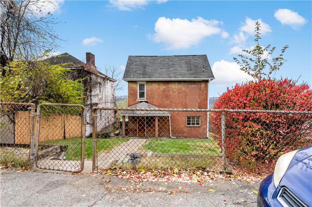 545 Stokes Avenue Braddock, PA 15104 - Photo 29 of 34 a front view of a house with a yard