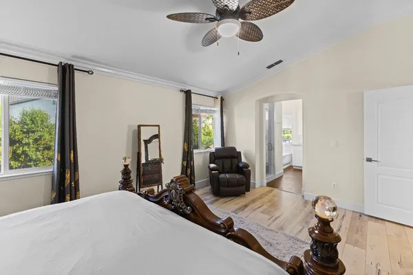 a bathroom with a double vanity sink and mirror
