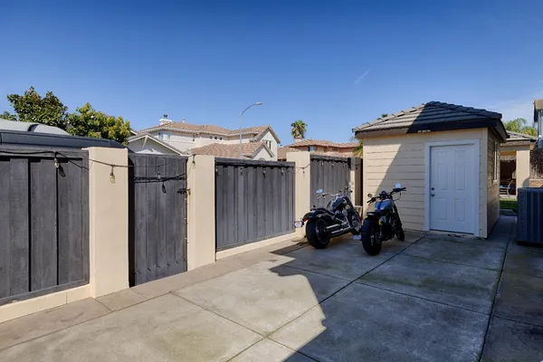 a view of backyard with cabin