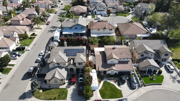 an aerial view of multiple houses