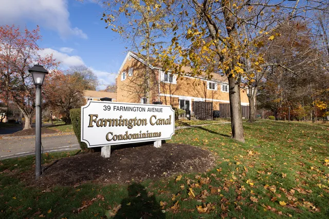 a sign on the side of the road