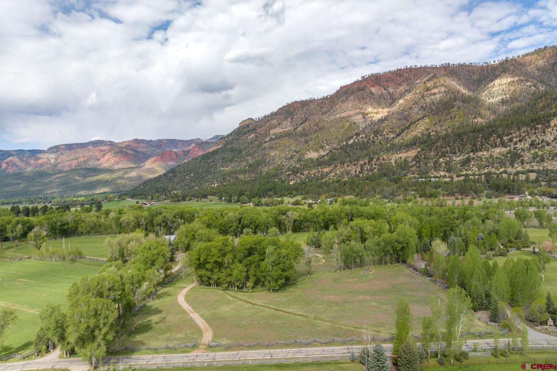 250 County Road 250 Durango, CO 81301 - Photo 14 of 32 a view of a town with mountains in the background