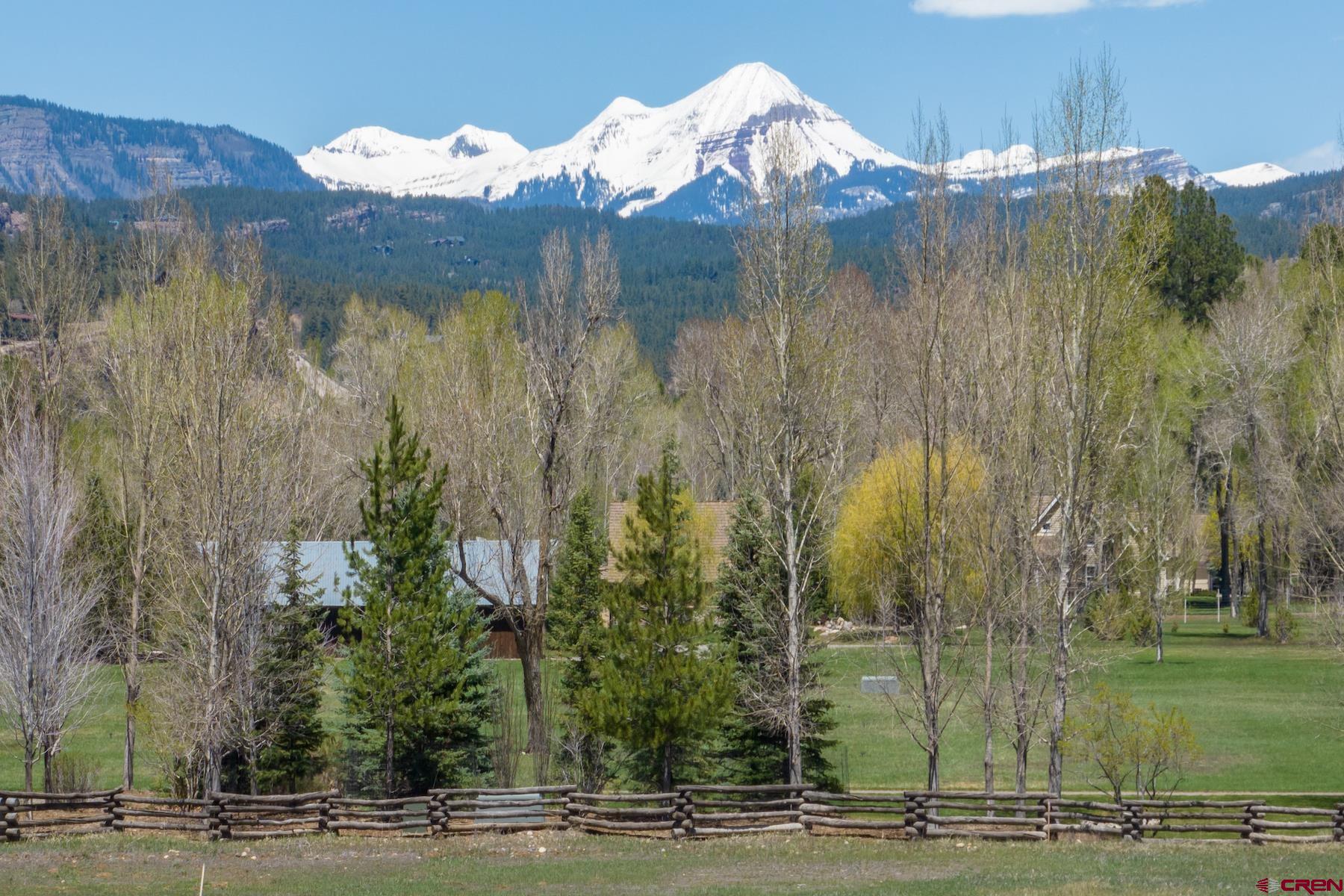 250 County Road 250 Durango, CO 81301 - Photo 16 of 32 a view of a fountain in middle of the green field