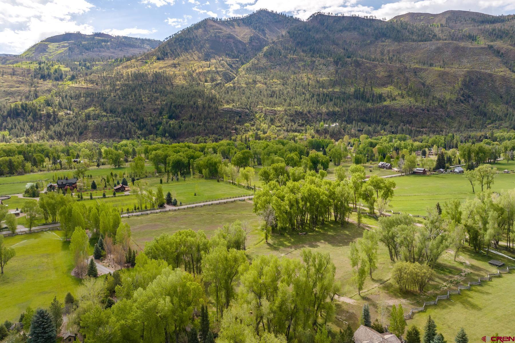 250 County Road 250 Durango, CO 81301 - Photo 6 of 32 a view of a lake with a mountain