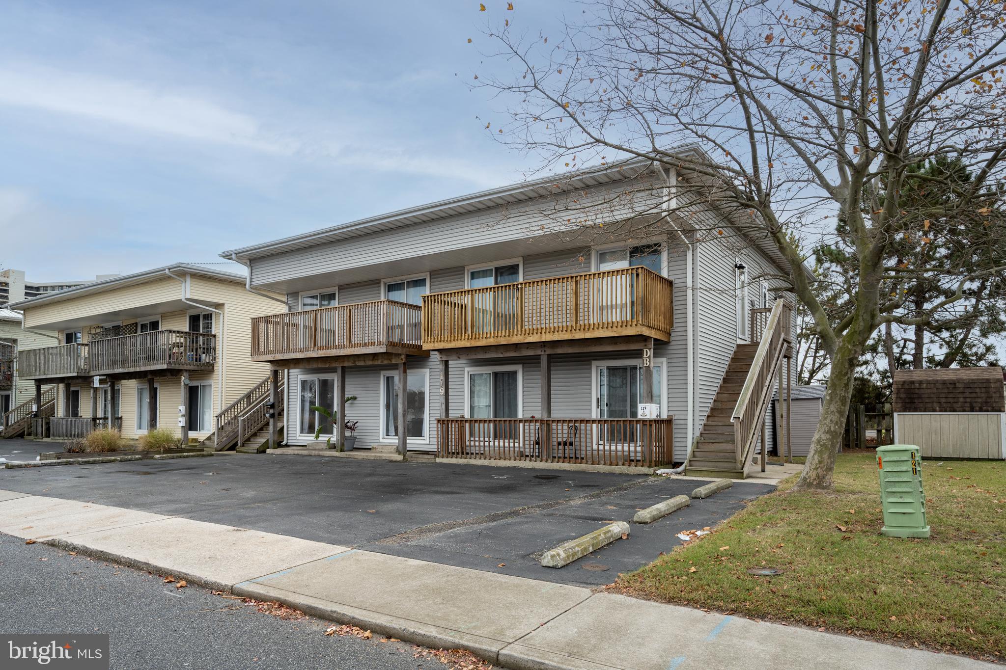 119 Jamestown Road, Unit A Ocean City, MD 21842 - Photo 2 of 2 a front view of a building with street