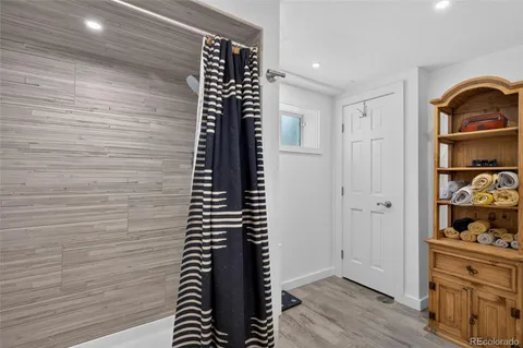 a view of entryway with wooden floor