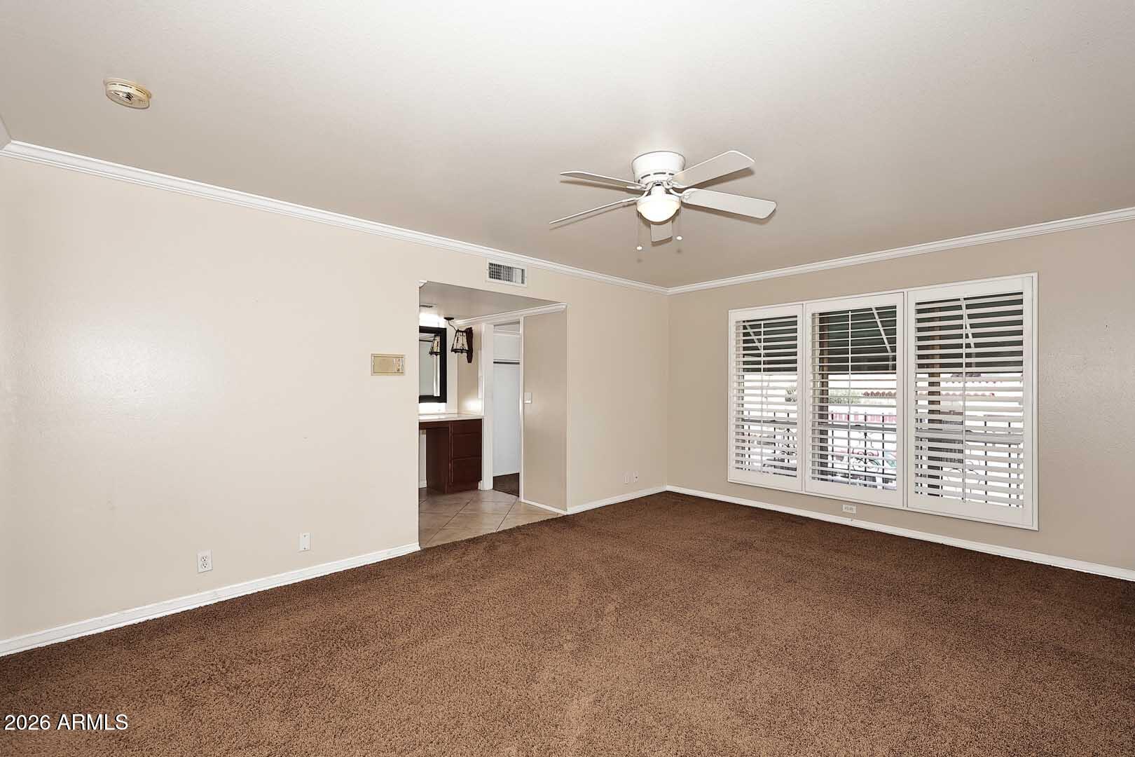 5426 South Lighthouse Lane Tempe, AZ 85283 - Photo 27 of 60 a view of an empty room with a window