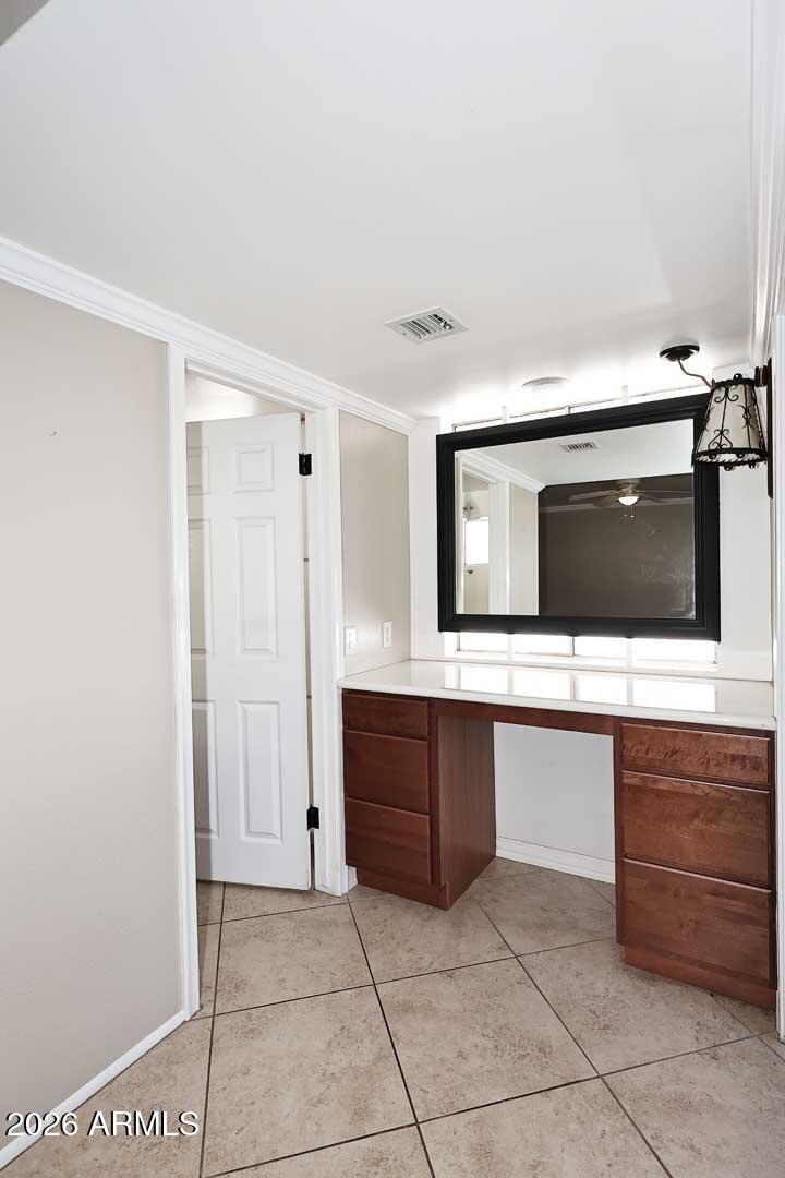 5426 South Lighthouse Lane Tempe, AZ 85283 - Photo 29 of 60 a kitchen with a sink and a microwave