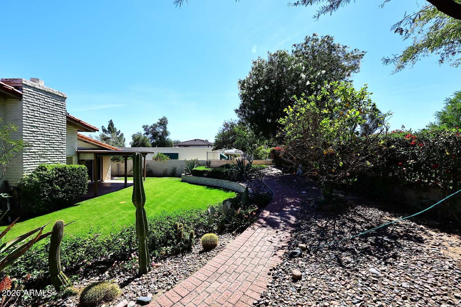 5426 South Lighthouse Lane Tempe, AZ 85283 - Photo 45 of 60 a view of a backyard with garden