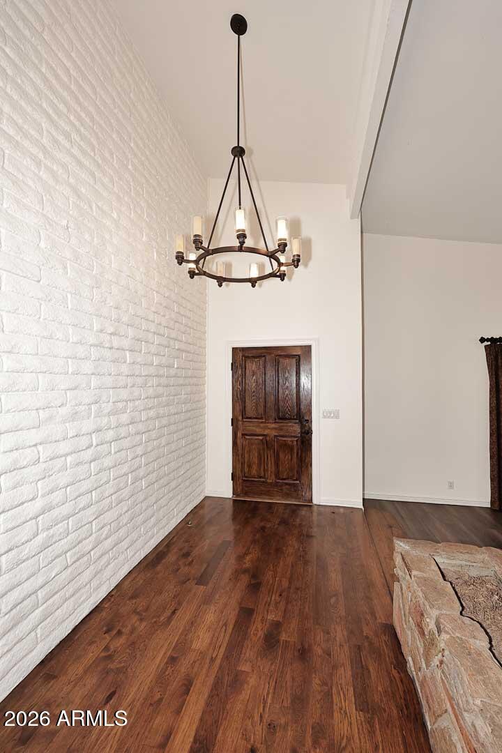 5426 South Lighthouse Lane Tempe, AZ 85283 - Photo 6 of 60 a view of empty room with wooden floor and ceiling fan
