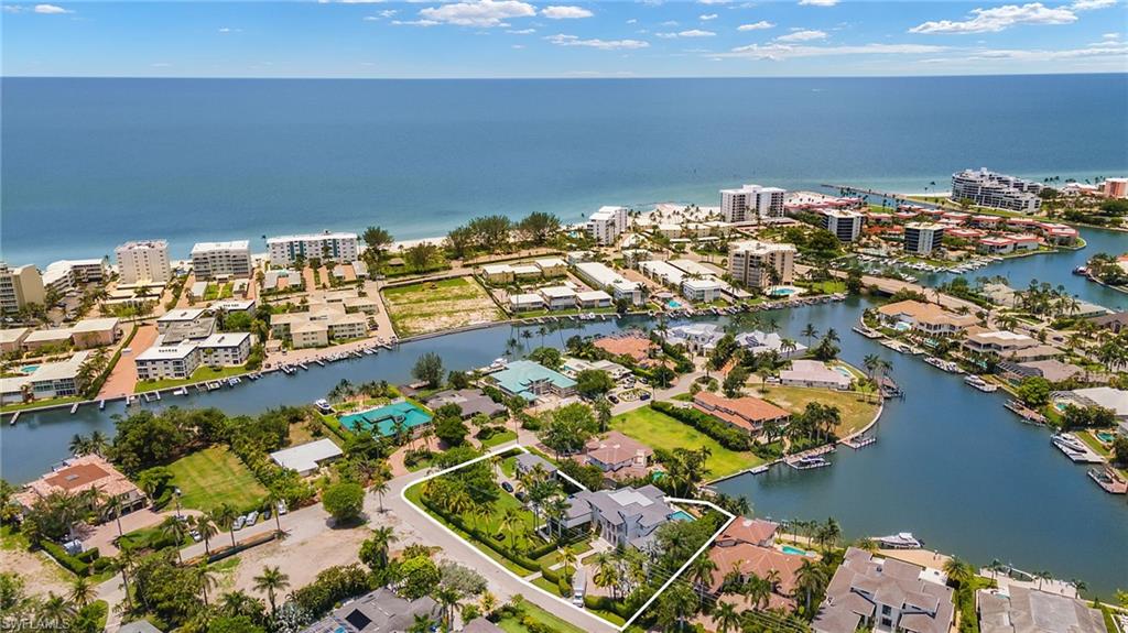 275 Springline Drive Naples, FL 34102 - Photo 48 of 50 View of urban area with a large body of water