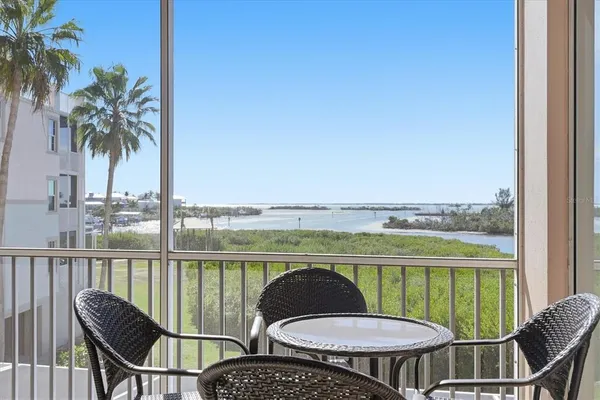 a view of a balcony with lake view and mountain view