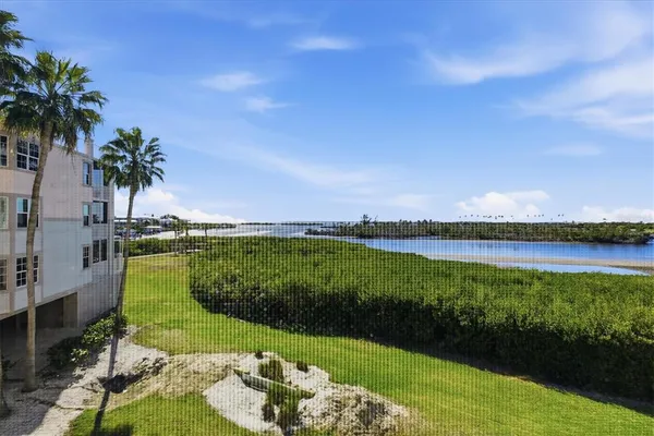 a view of a lake with a garden