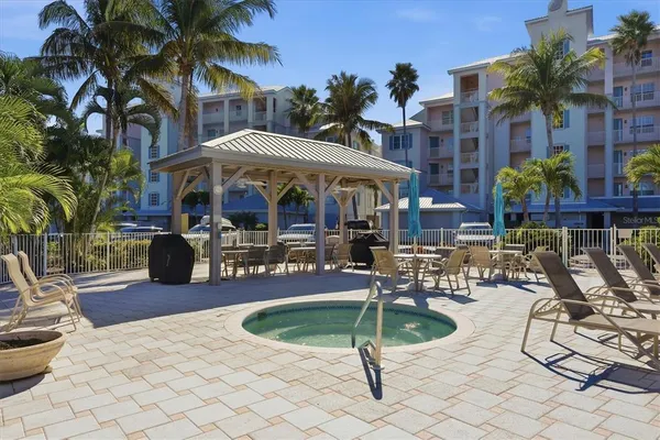 a view of a swimming pool with chairs