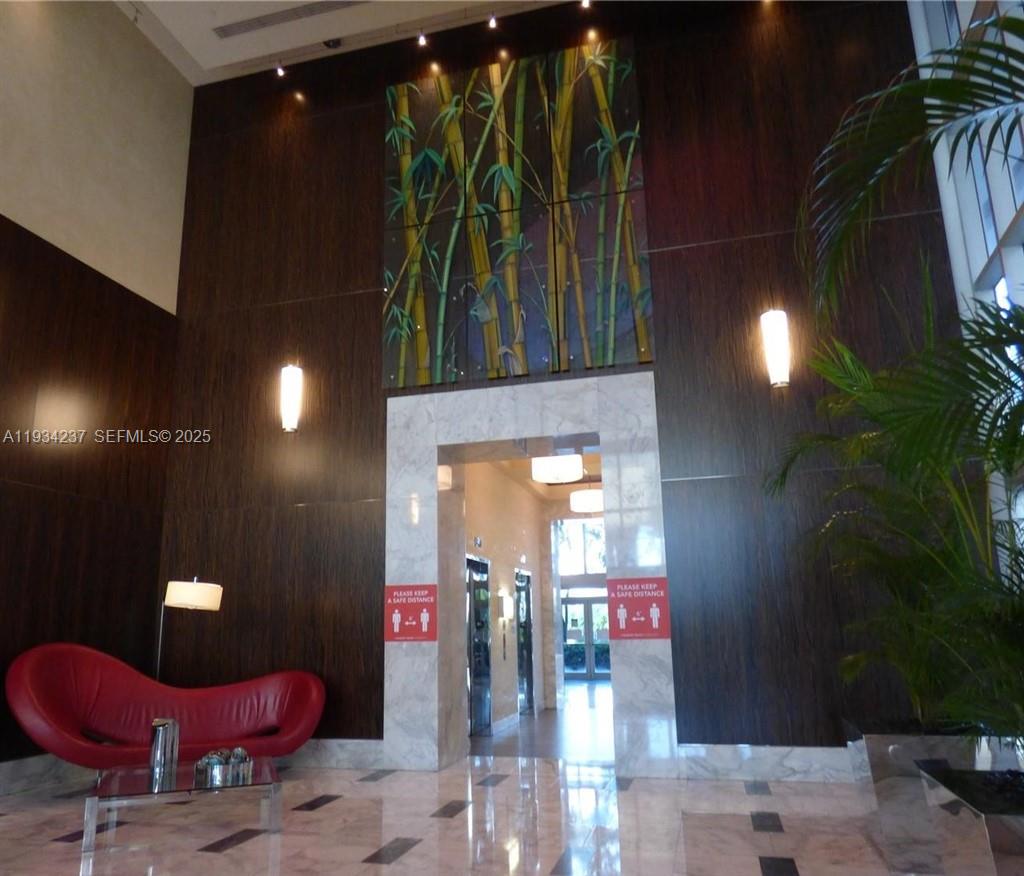 185 Southwest 7th Street, Unit 3109 Miami, FL 33130 - Photo 19 of 25 a view of a entryway door of the building