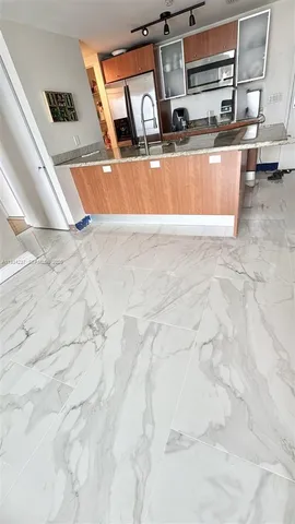 a view of swimming pool with outdoor seating