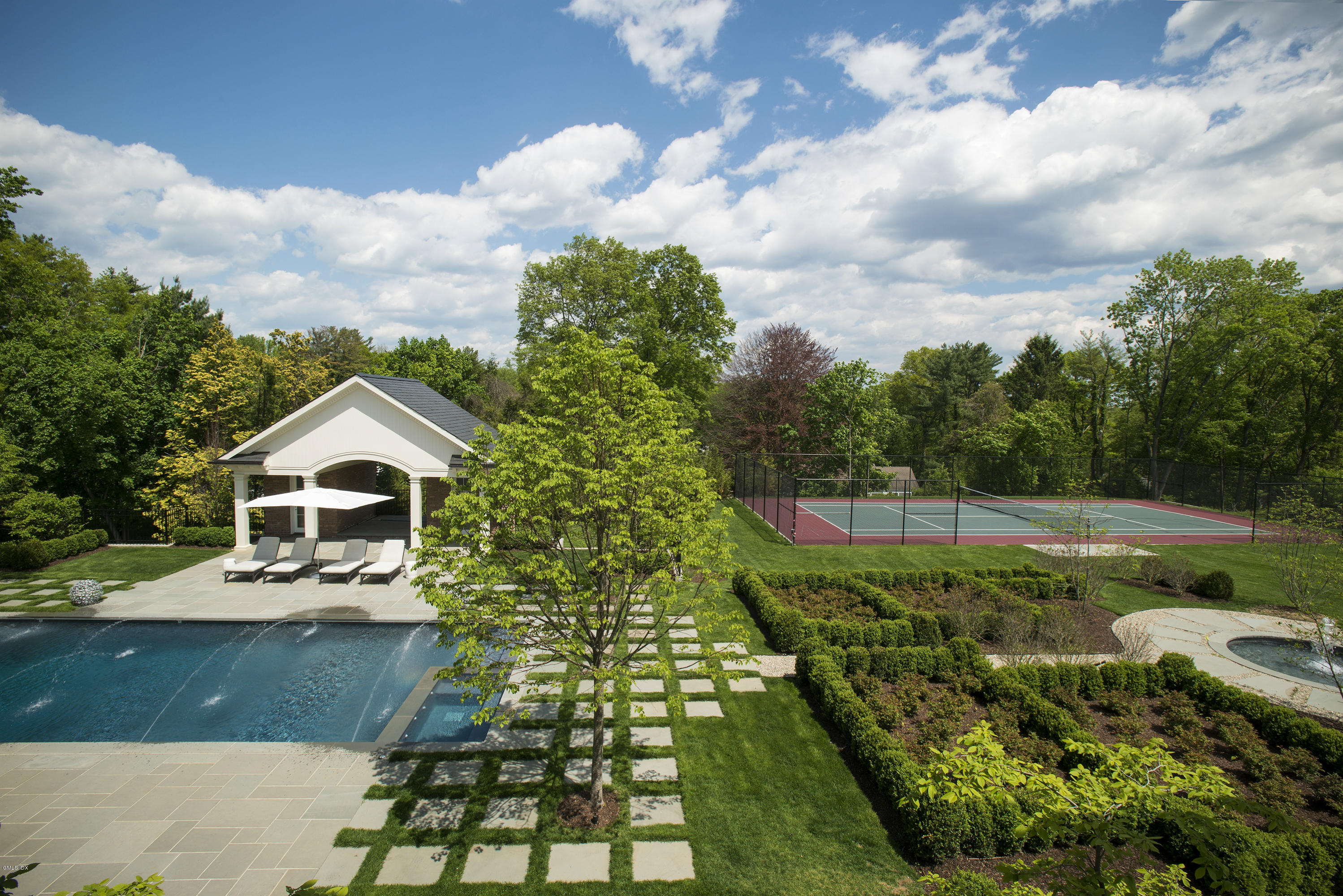 547 Lake Avenue Greenwich, CT 06830 - Photo 23 of 26 a view of a house with a yard