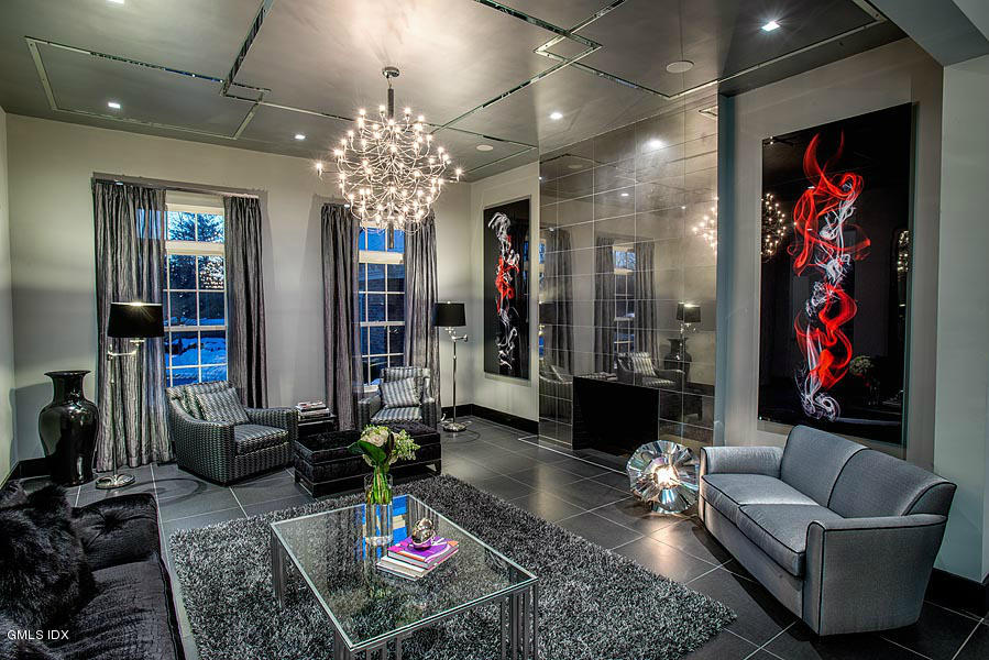 547 Lake Avenue Greenwich, CT 06830 - Photo 4 of 26 a living room with furniture and a chandelier