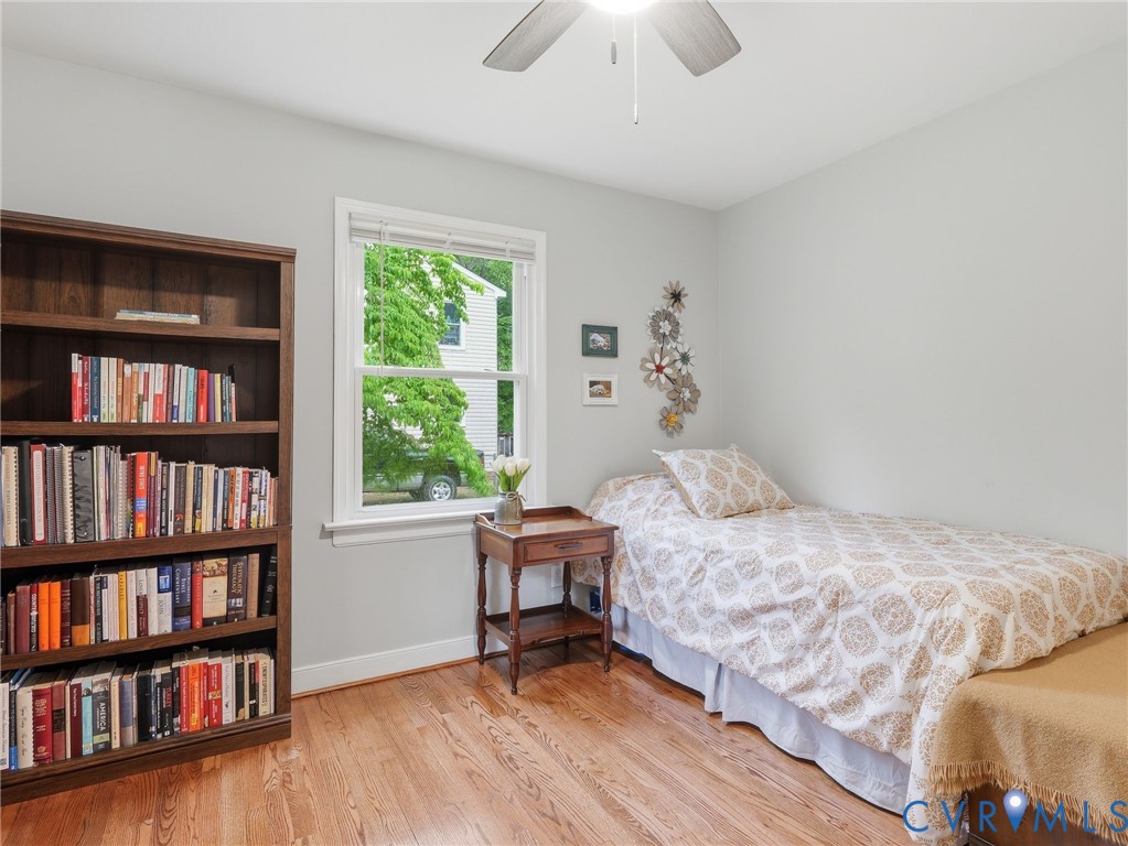 7707 Woodbrook Road Quinton, VA 23141 - Photo 25 of 42 Bright room featuring hardwood flooring, a large w