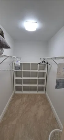 a view of an empty room with empty racks