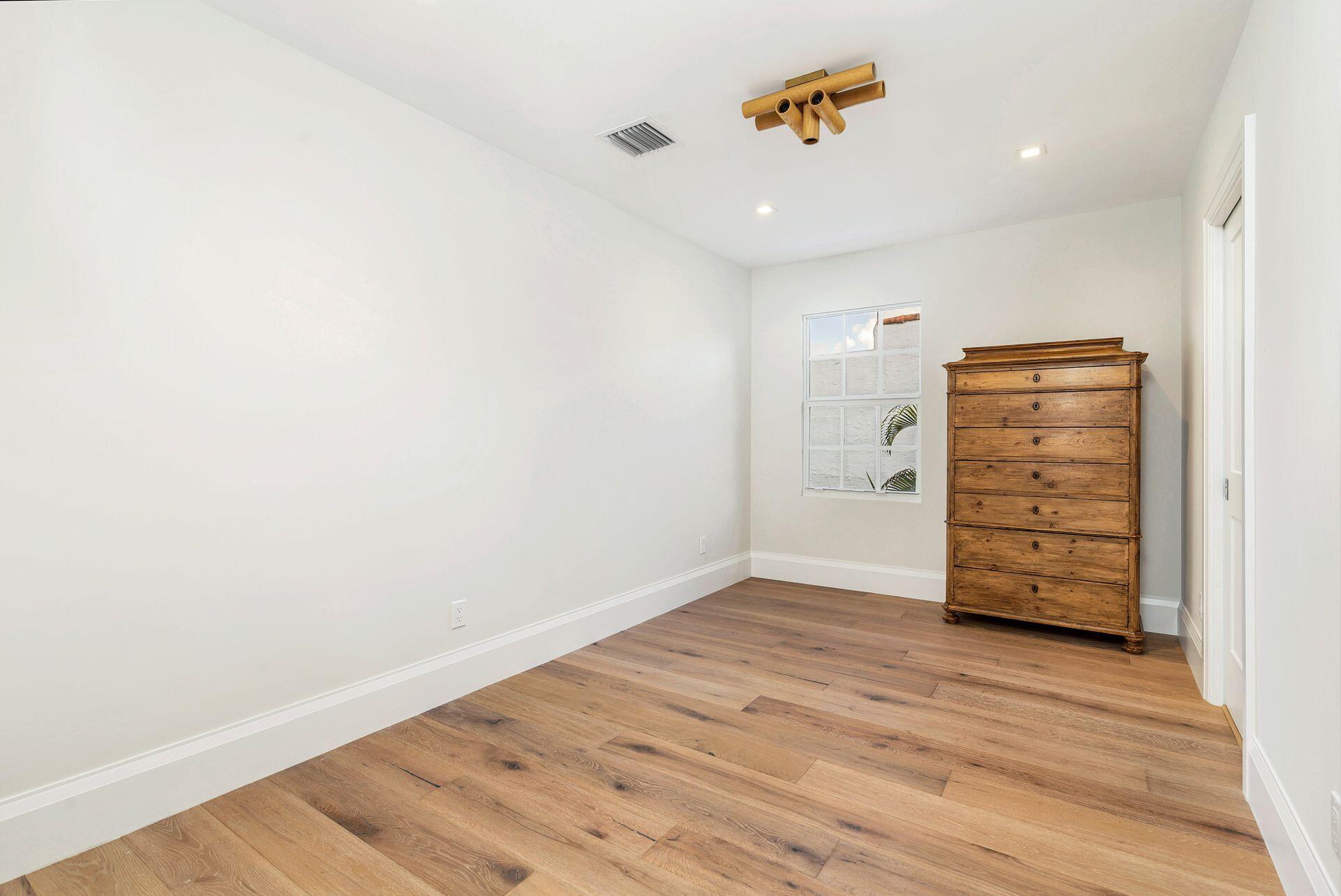 231 Argyle Road West Palm Beach, FL 33405 - Photo 18 of 41 wooden floor in an empty room