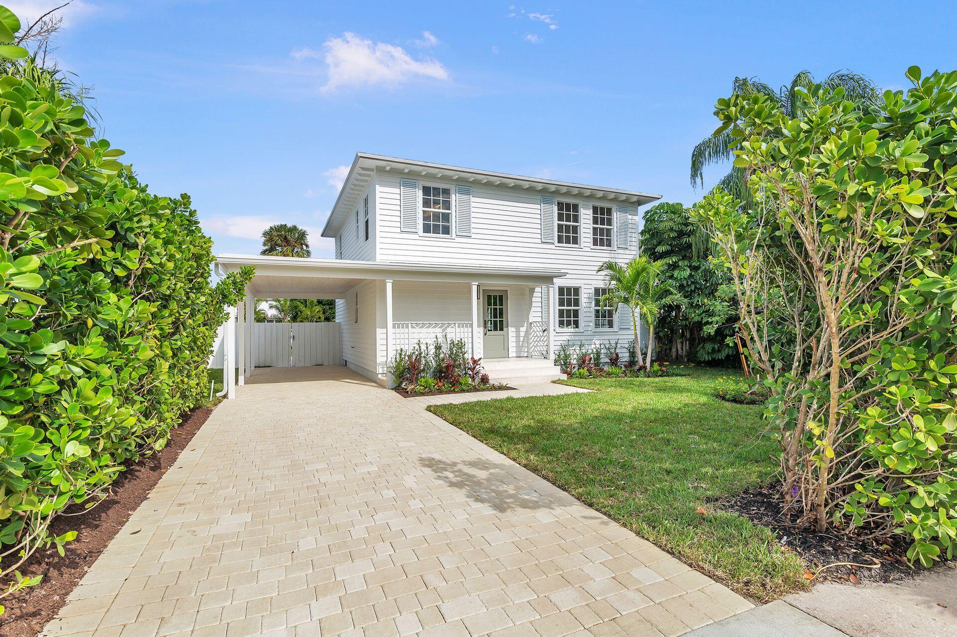 231 Argyle Road West Palm Beach, FL 33405 - Photo 2 of 41 front view of a house with a yard