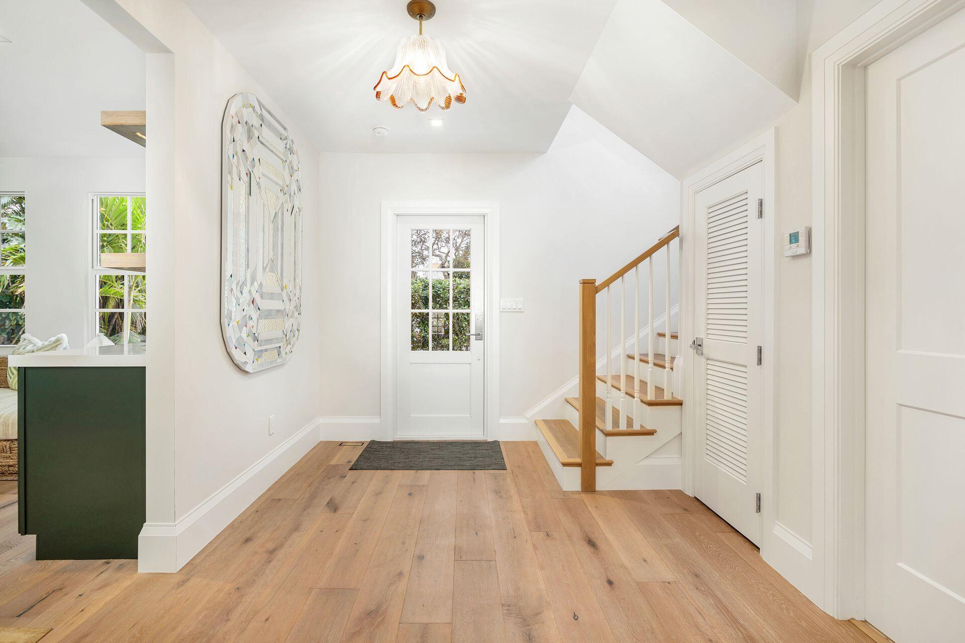 231 Argyle Road West Palm Beach, FL 33405 - Photo 21 of 41 a view of an entryway with wooden floor and door