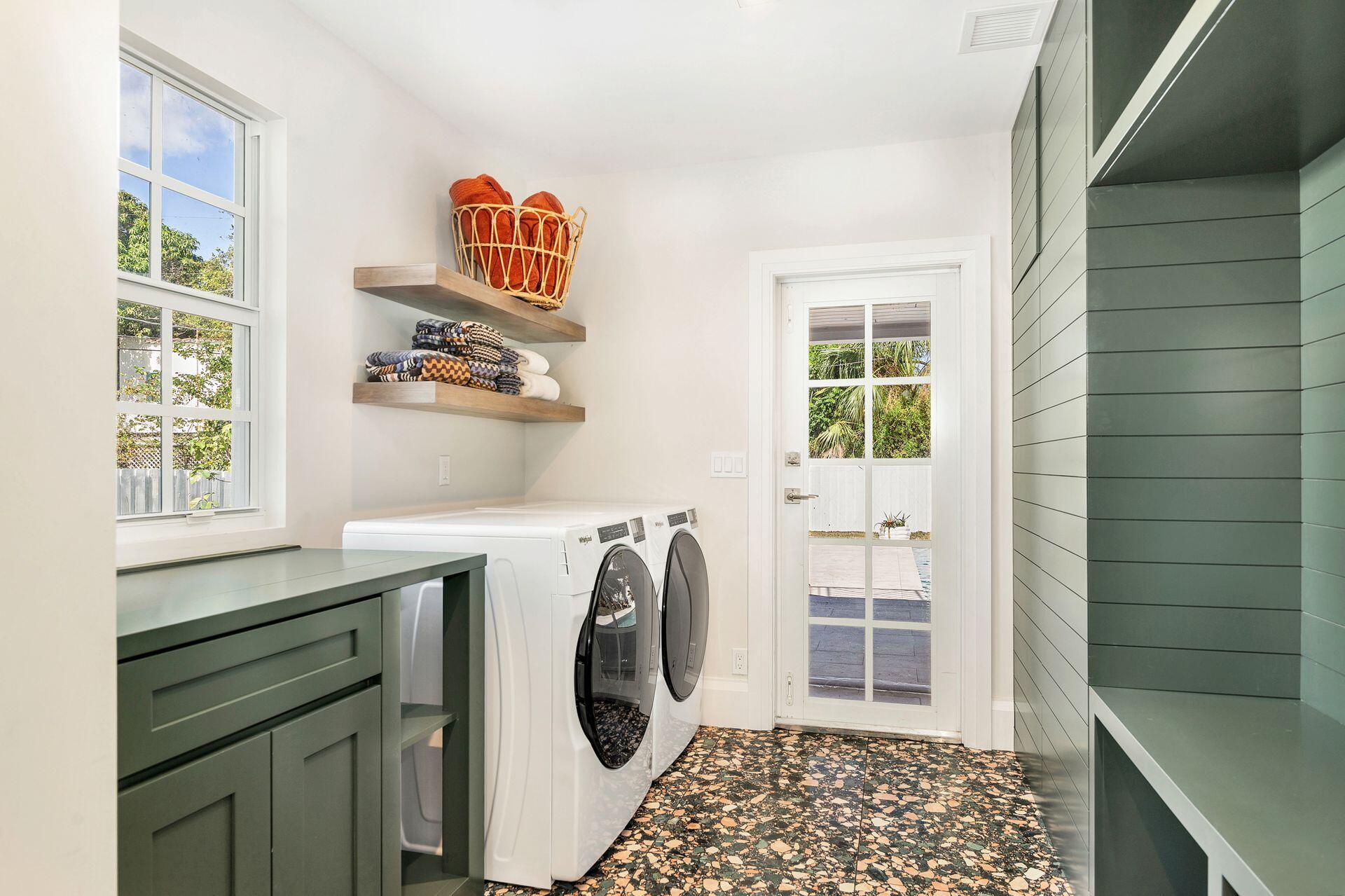 231 Argyle Road West Palm Beach, FL 33405 - Photo 23 of 41 a utility room with a window dryer and washer
