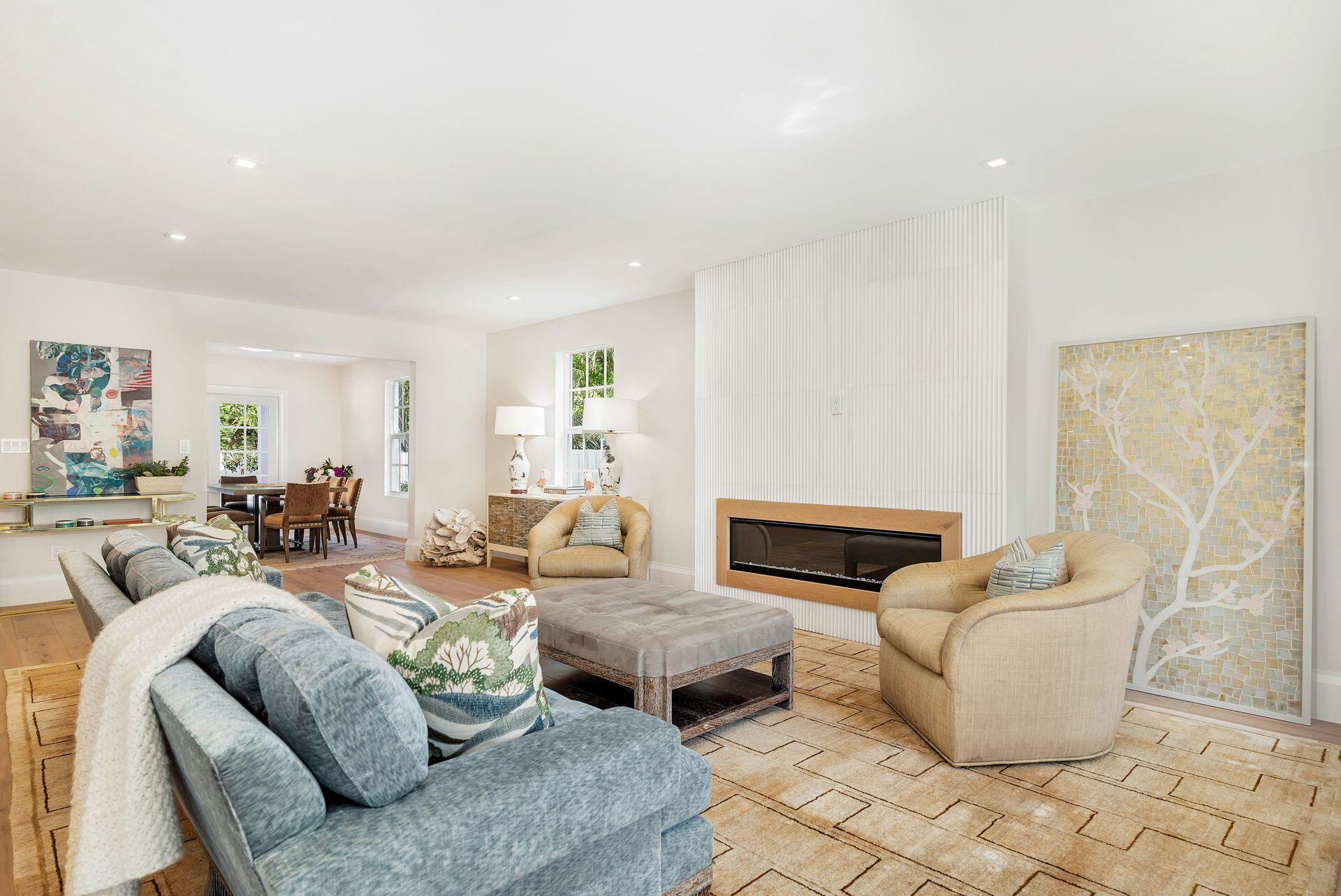 231 Argyle Road West Palm Beach, FL 33405 - Photo 3 of 41 a living room with furniture and a fireplace
