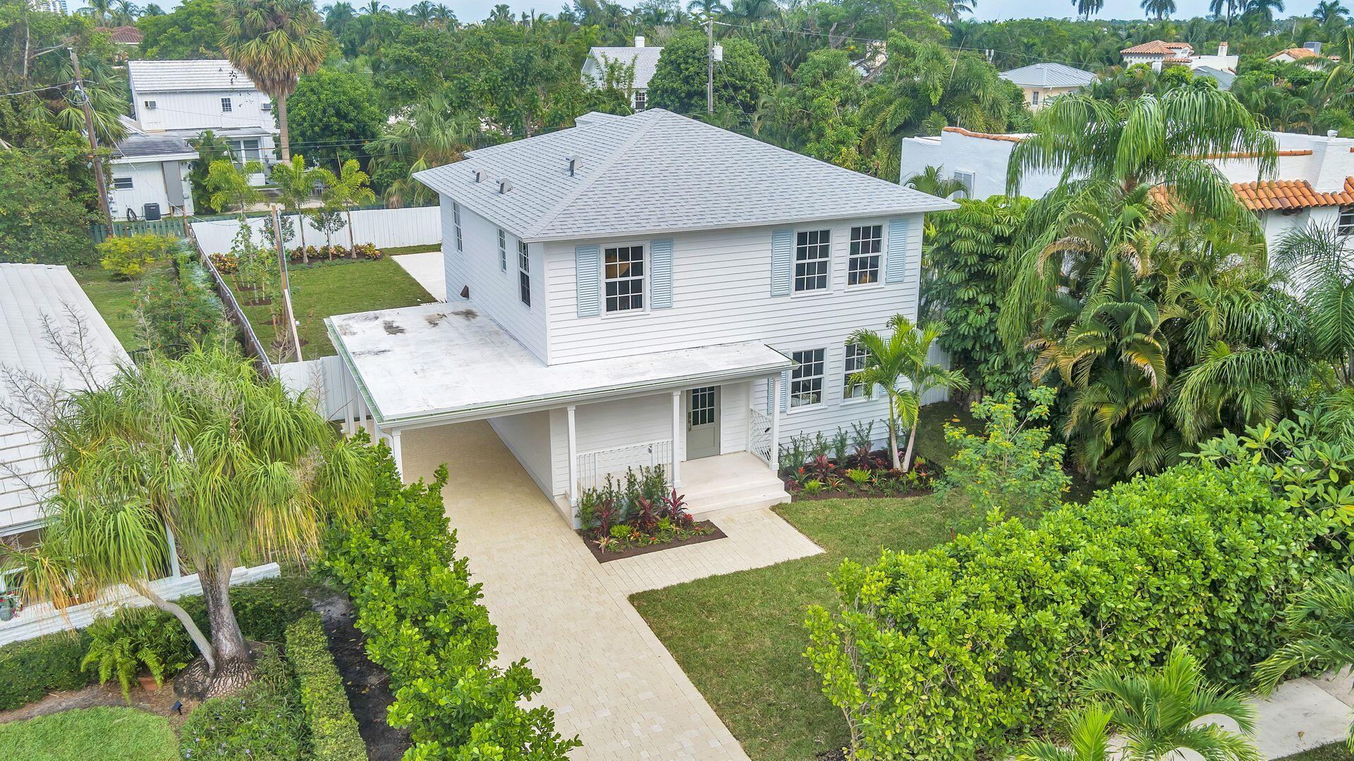 231 Argyle Road West Palm Beach, FL 33405 - Photo 33 of 41 a aerial view of a house with a yard plants and large tree
