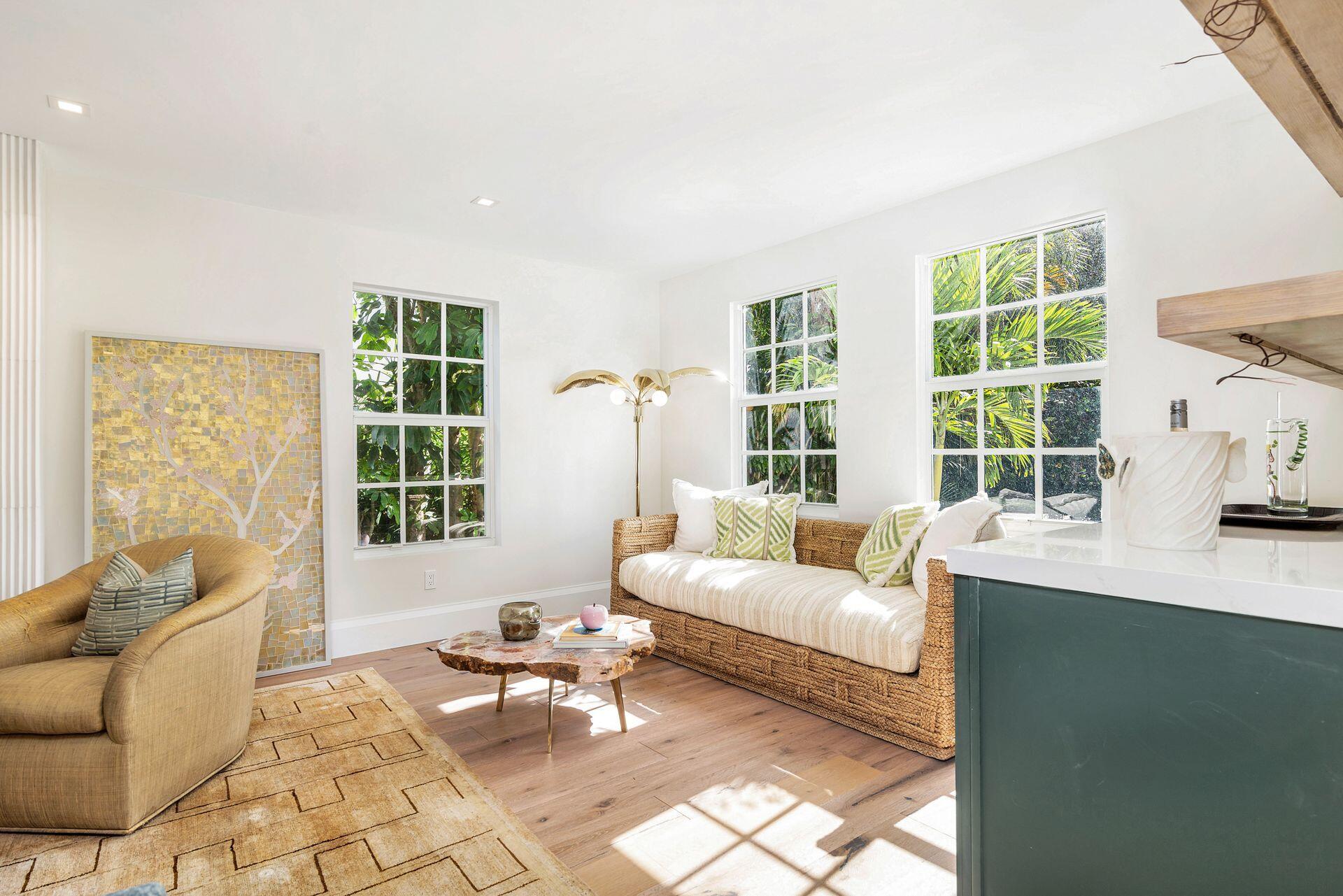 231 Argyle Road West Palm Beach, FL 33405 - Photo 6 of 41 a living room with furniture and floor to ceiling windows