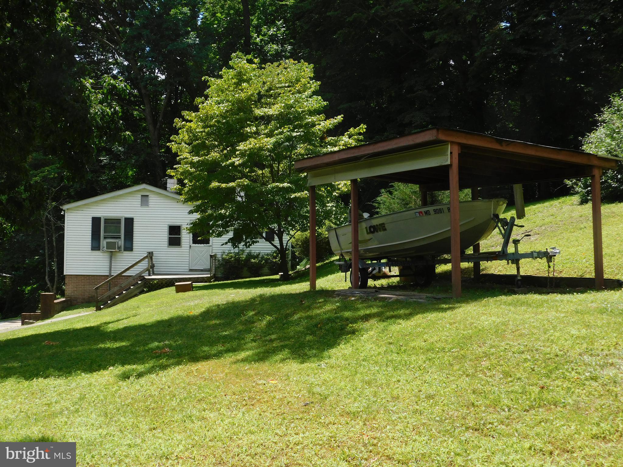 1902 Ruffs Mill Road Bel Air, MD 21015 - Photo 4 of 23 Side View with Upper Driveway Carport (boat excl.)