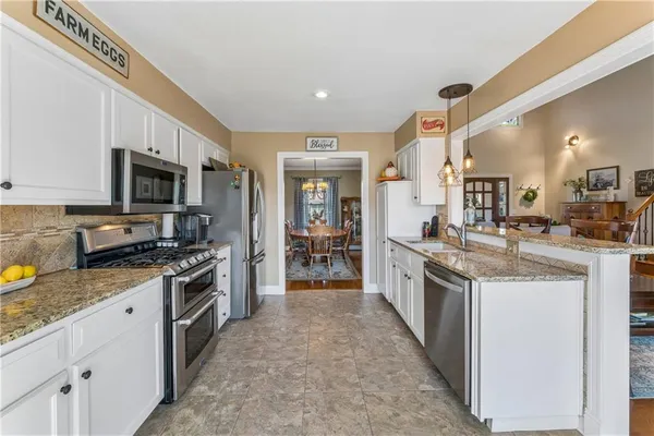 $414,900 | 3711 Northeast Beechwood Drive, Lee's Summit, MO 64064